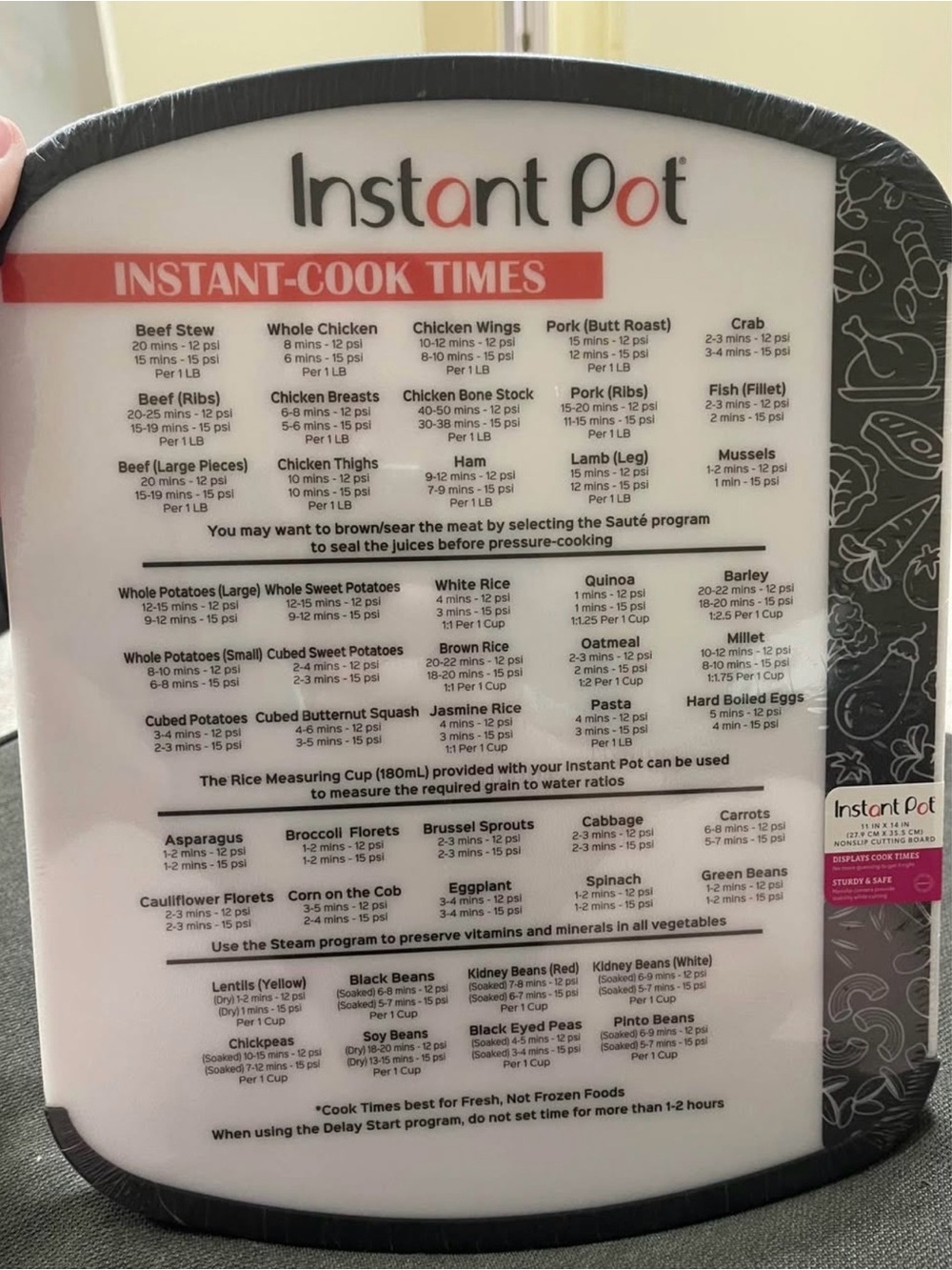 Brand new Instant Pot plastic cutting board with cooking times printed.